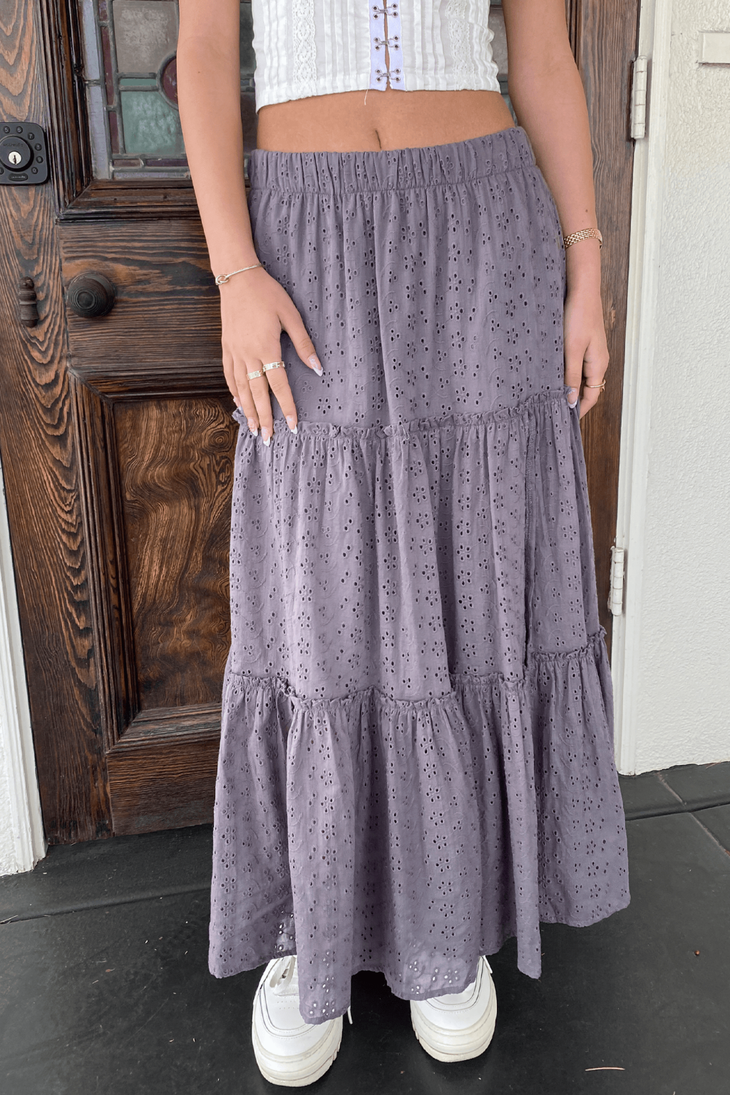 Chic Eyelet Maxi Skirt Featuring Intricate Patterns and Flowing Silhouette