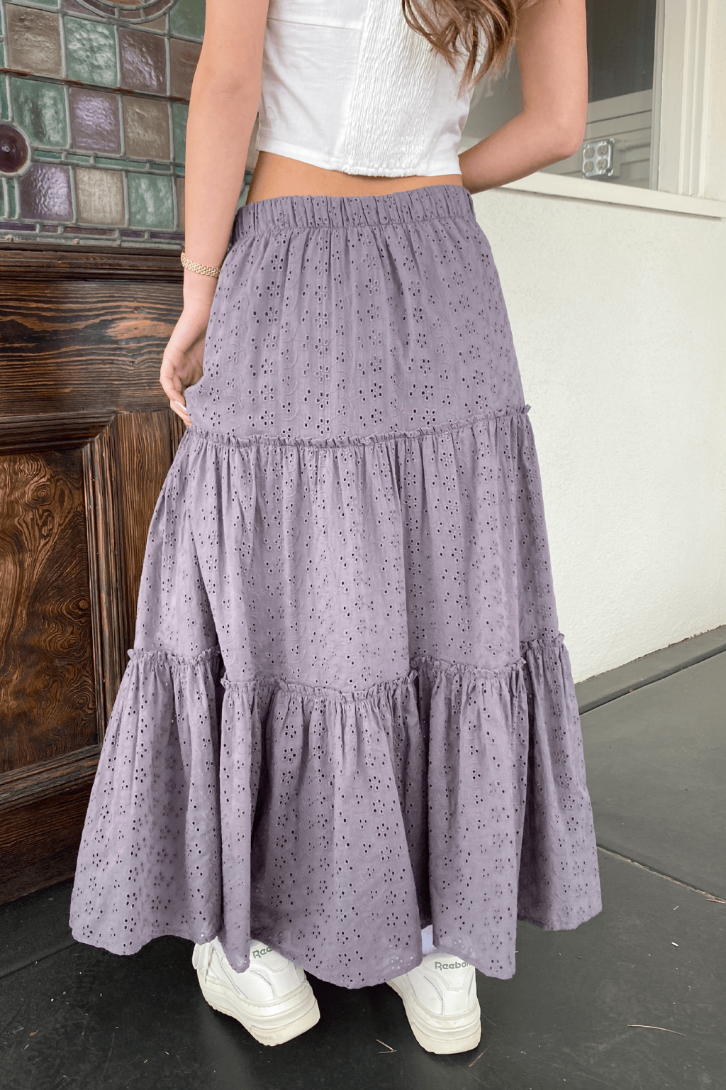 Chic Eyelet Maxi Skirt Featuring Intricate Patterns and Flowing Silhouette